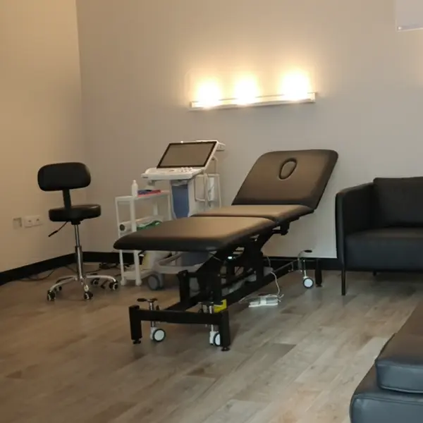 the interior of the serenitiscan clinic, with dimmed lighting and a relaxing atmosphere